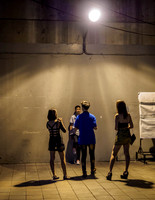 Against the wall